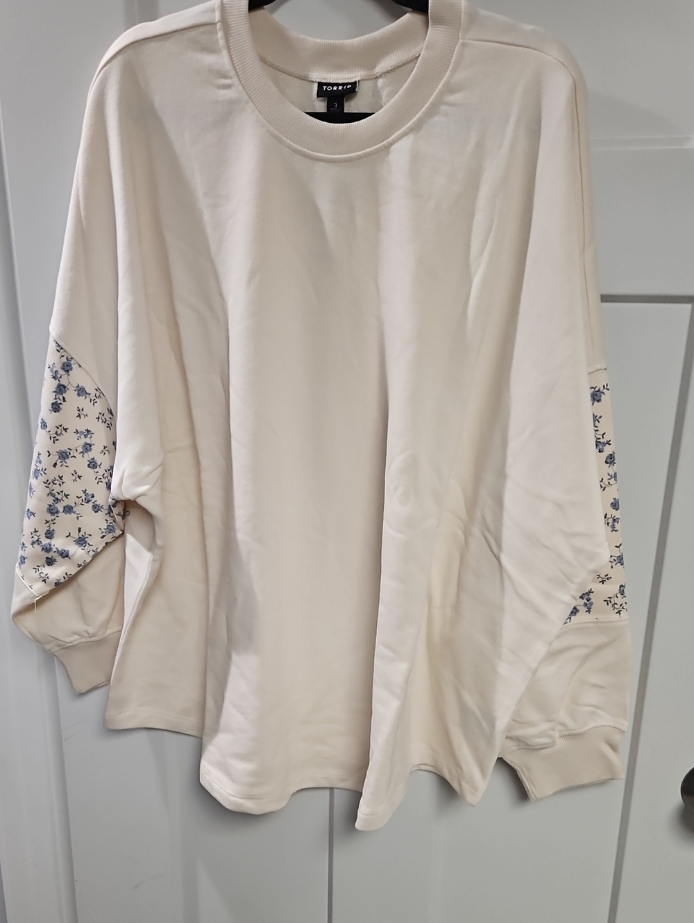 torrid Cream Sweatshirt with Blue Floral Sleeve Panels